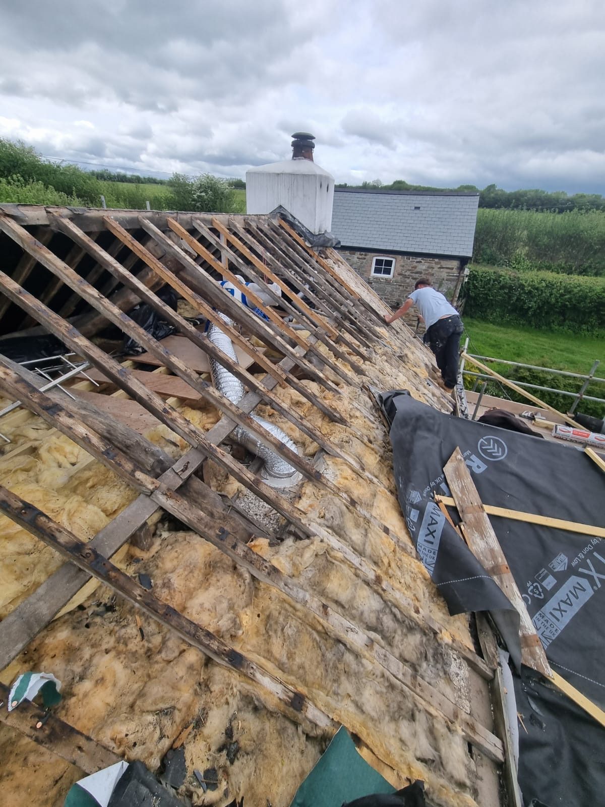 Full strip and re-roof — Cornish farmhouse