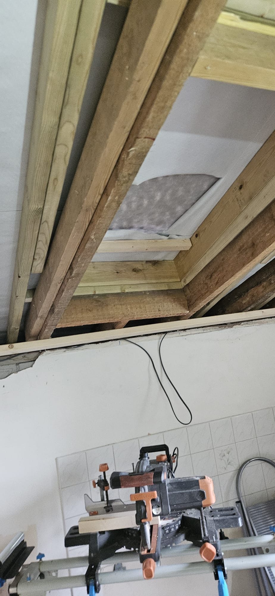 Velux installation in progress with new timber frame