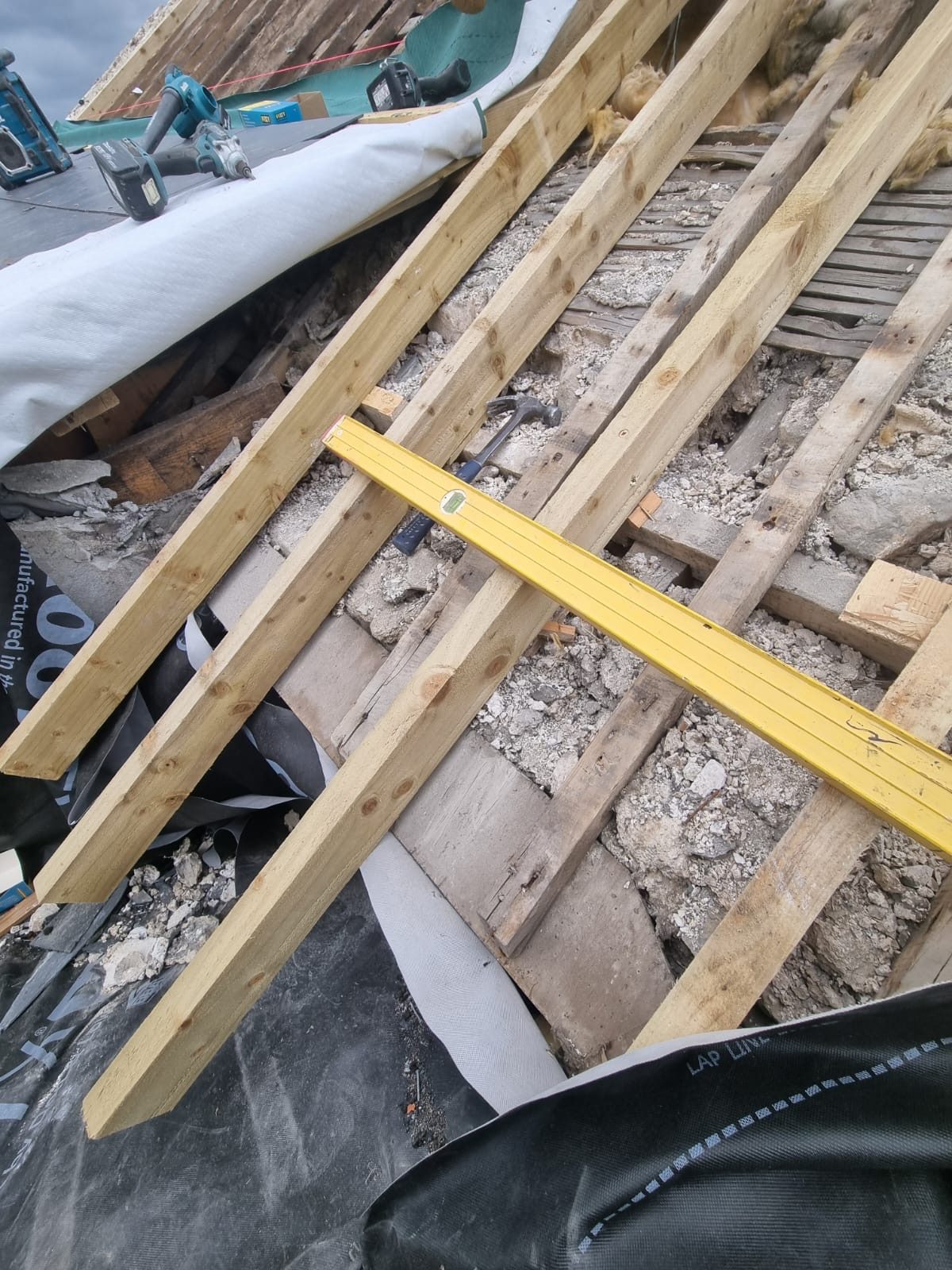 Fresh treated battens over original rafters